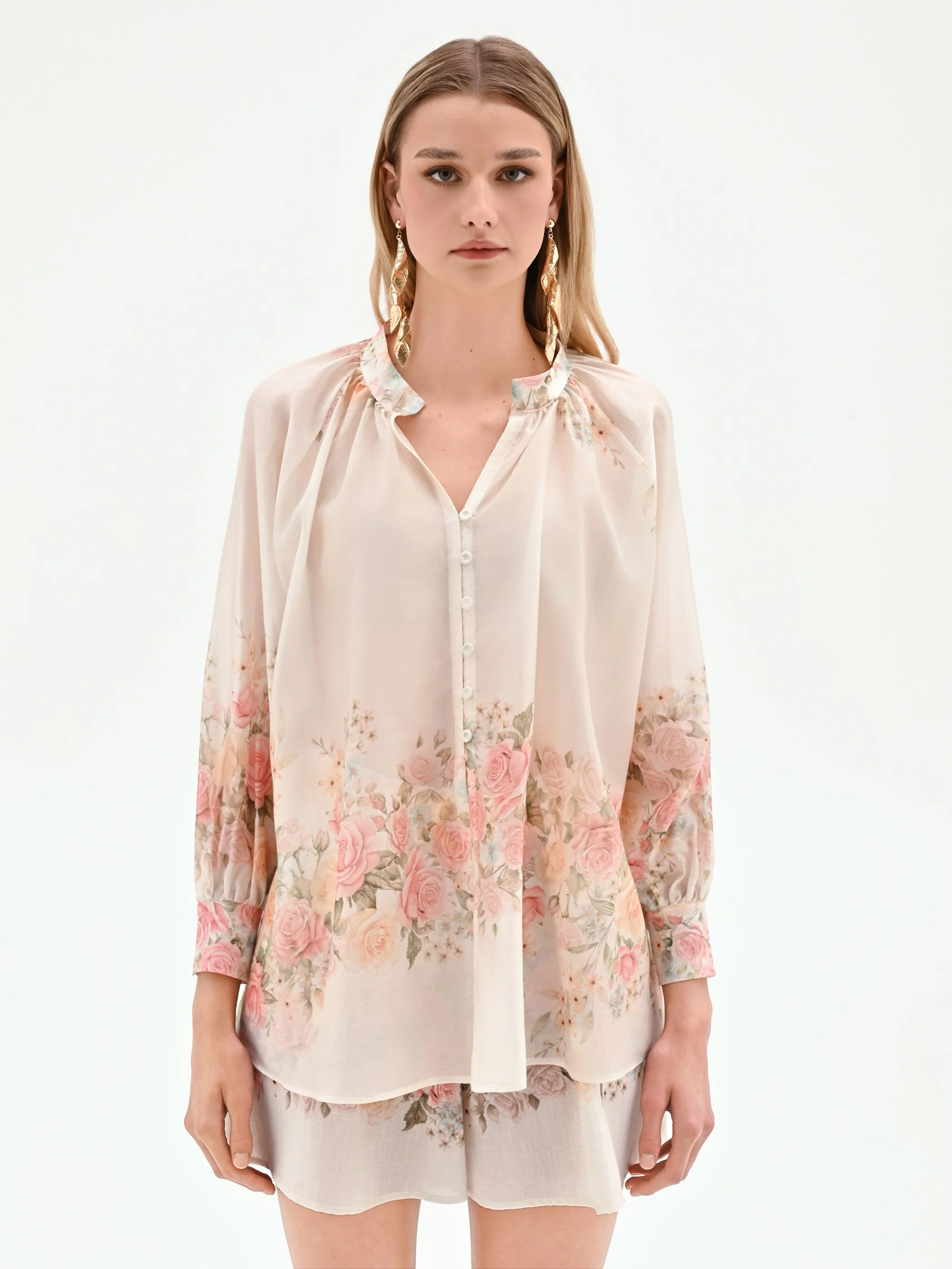 Blusa bianca con stampa floreale a rose