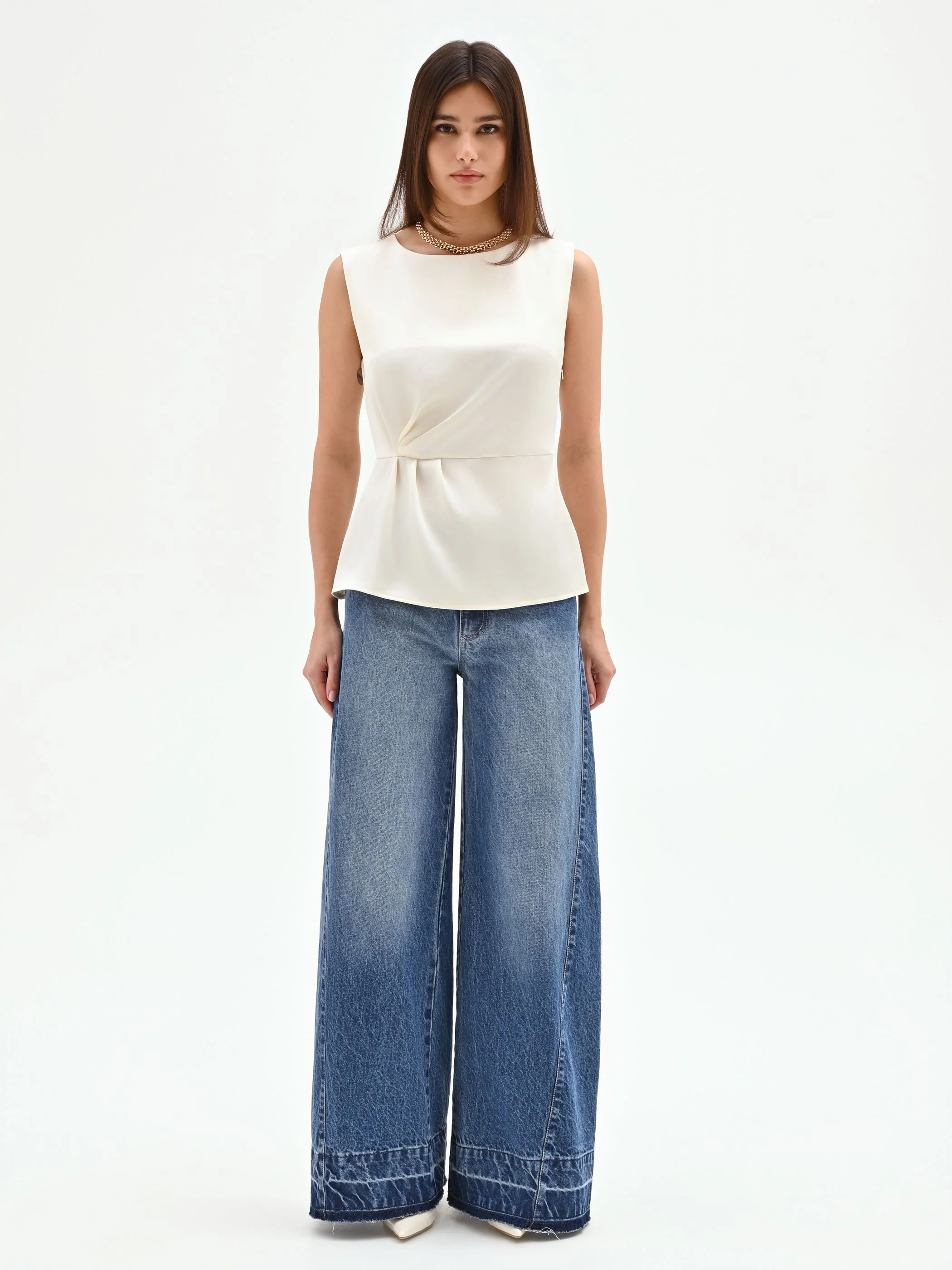 Blusa bianco panna con drappeggio laterale