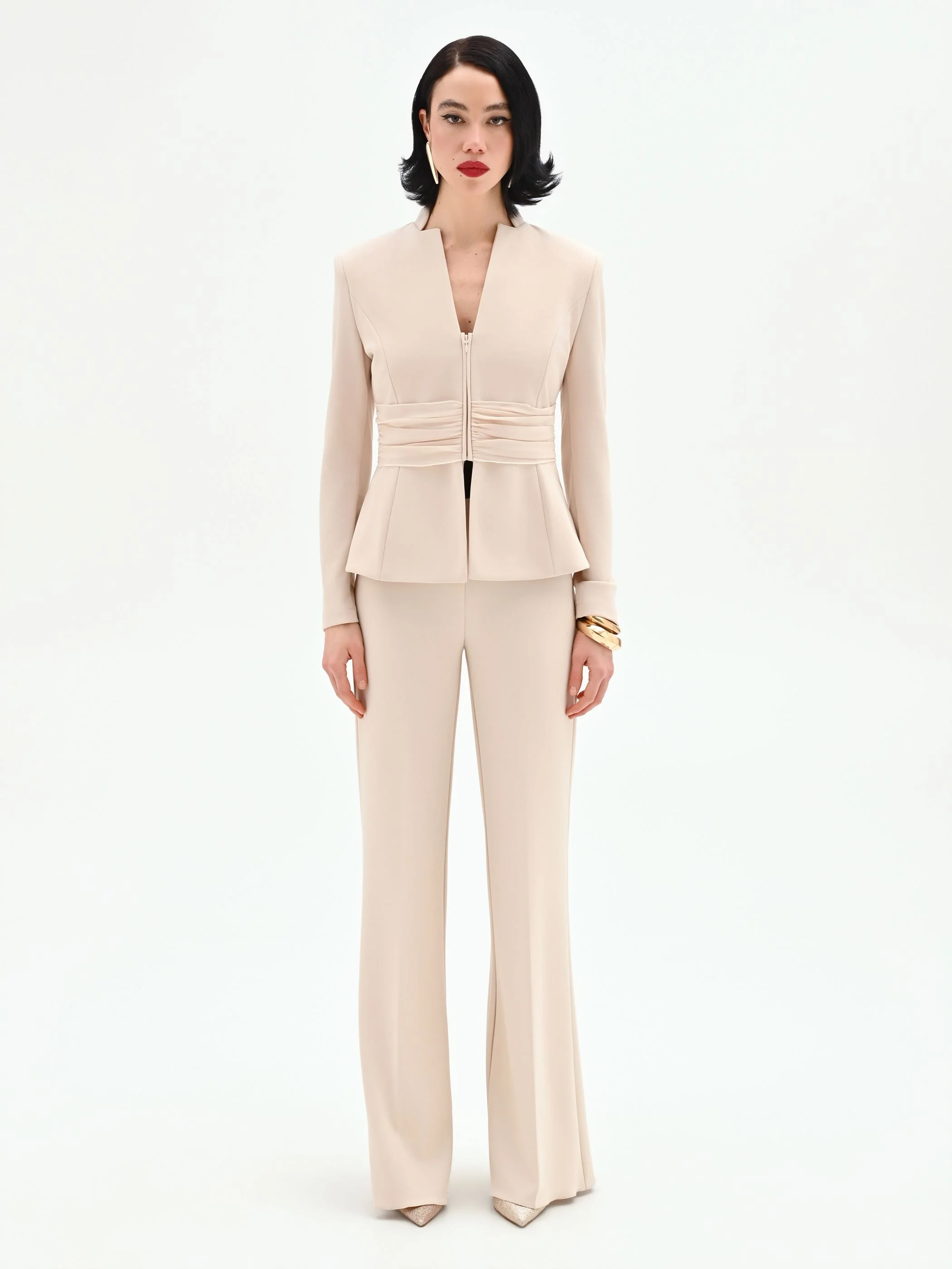 Giacca beige chiaro con drappeggio in vita