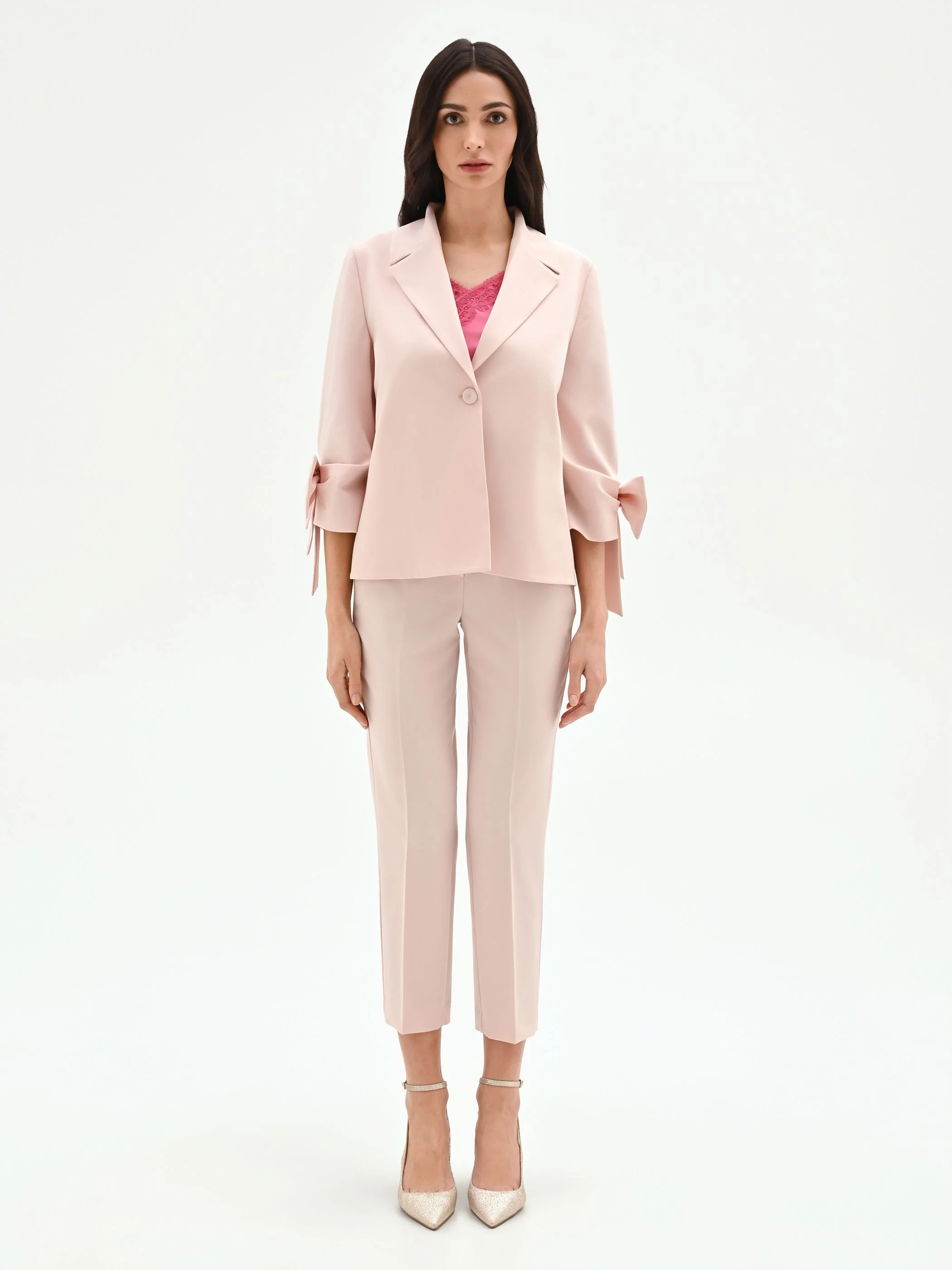 Giacca blazer rosa con fiocco sulla manica