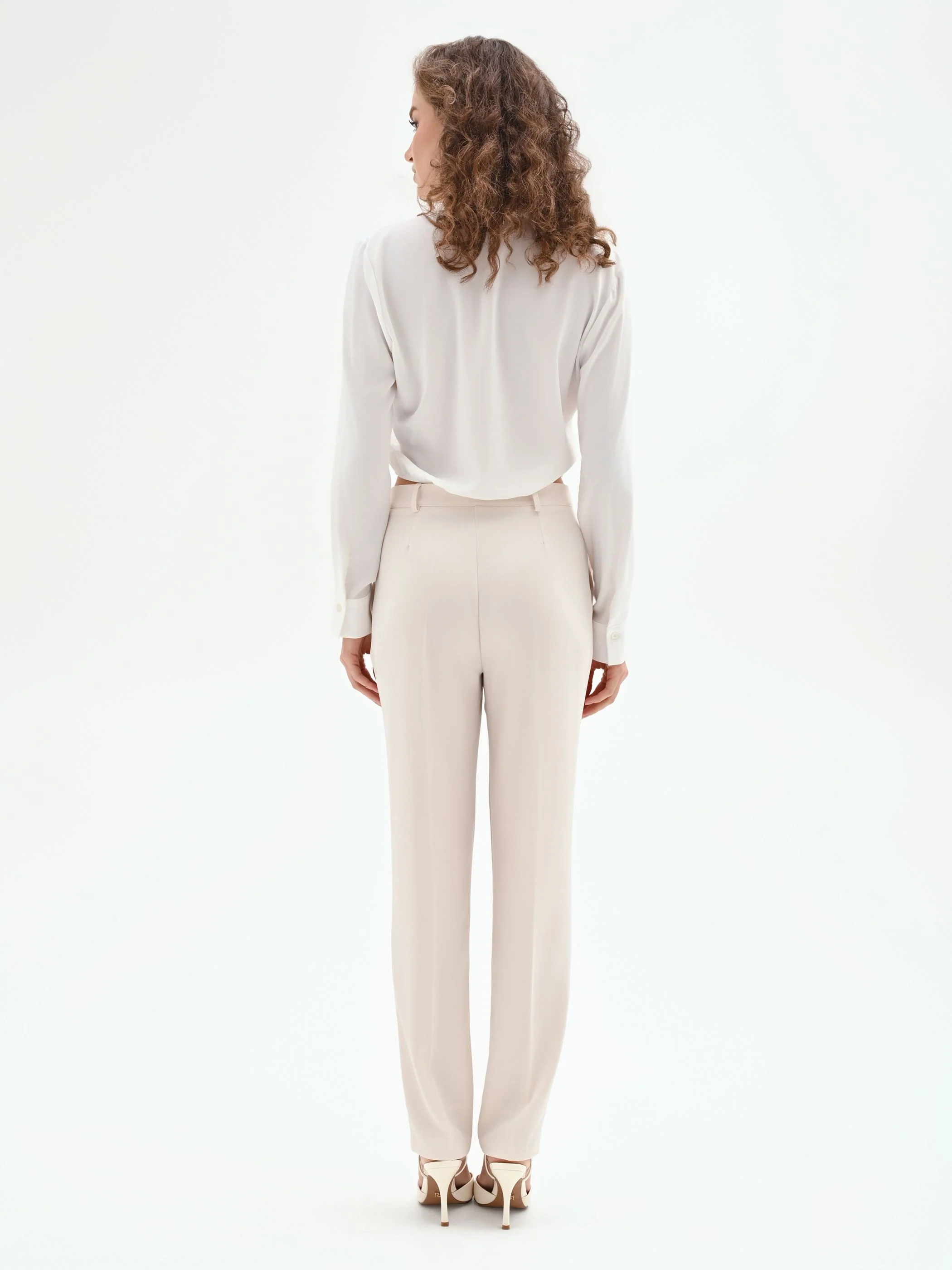 Pantaloni slim bianchi in tessuto fluido mano Crepe